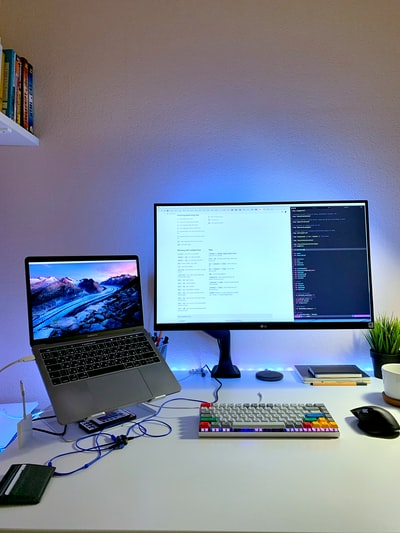 Black tablet display in black beside a computer mouse to open a computer keyboard and black
